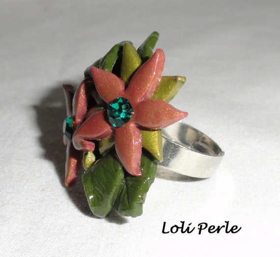 Brown clay flower ring with Swarovski crystal and green foliage