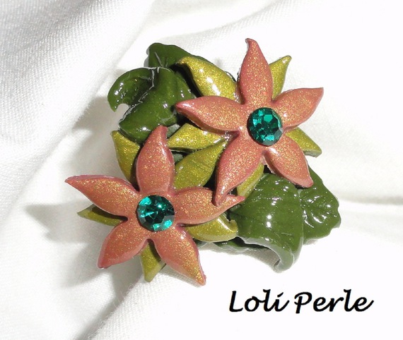 Brown clay flower ring with Swarovski crystal and green foliage