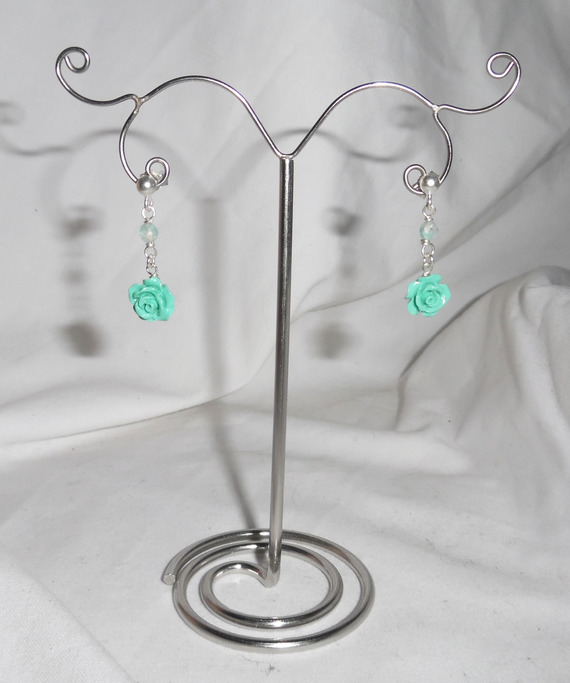 Earrings with green carved gorgonian roses and agates on 925 silver studs