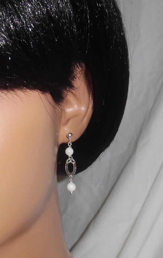 Mother of pearl earrings with horseshoe on 925 silver studs