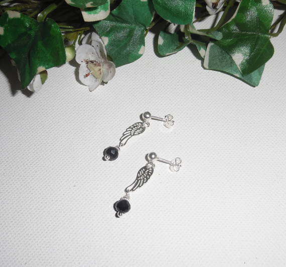 Black crystal bead earrings with wing on 925 silver studs