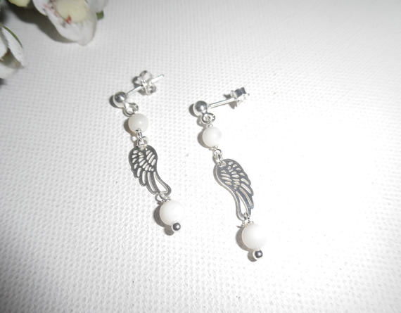 Mother of pearl earrings with wing on 925 silver studs