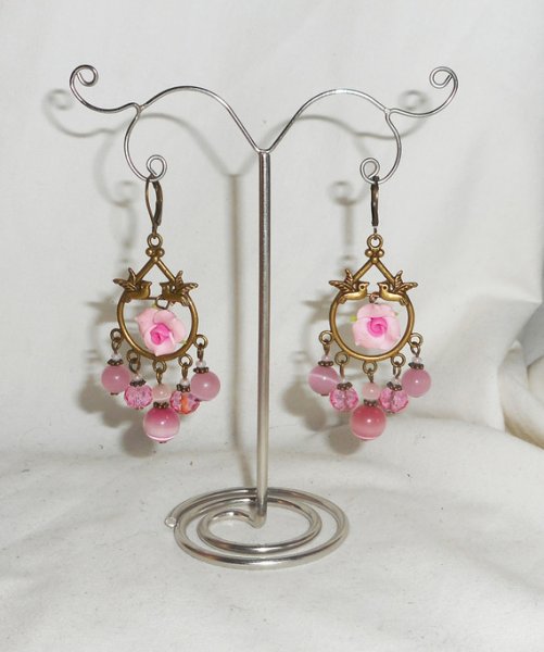 Birds and roses earrings on bronze sleeper