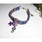 Colorful fabric bracelet with seahorse and purple starfish tassels