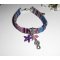 Colorful fabric bracelet with seahorse and purple starfish tassels