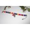 Colorful fabric bracelet with dolphin and red starfish tassels