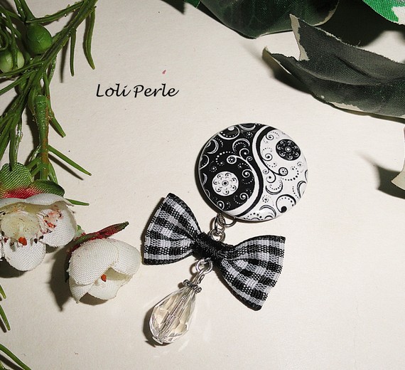 Peace and love brooch with crystal bow and drop