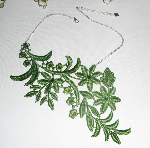 Necklace in fine green embroidery with flower design and crystal on silver chain