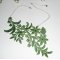 Necklace in fine green embroidery with flower design and crystal on silver chain