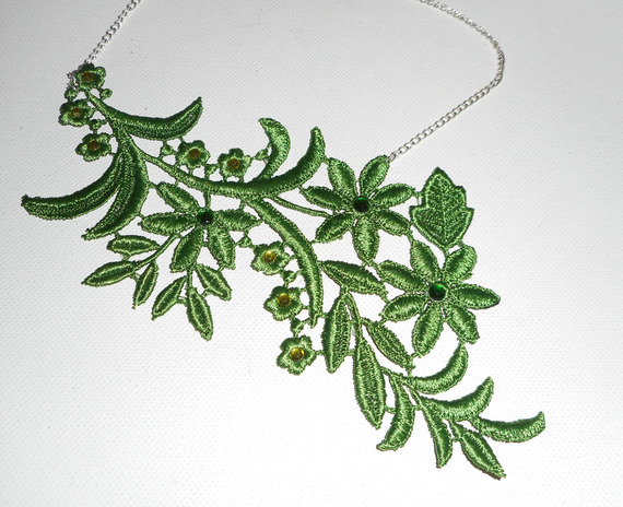 Necklace in fine green embroidery with flower design and crystal on silver chain