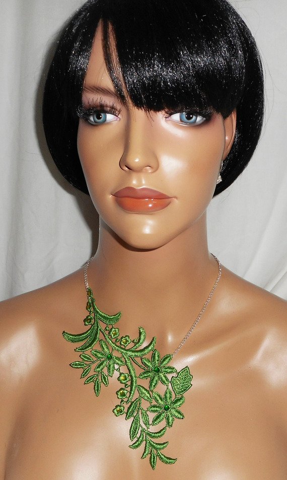 Necklace in fine green embroidery with flower design and crystal on silver chain