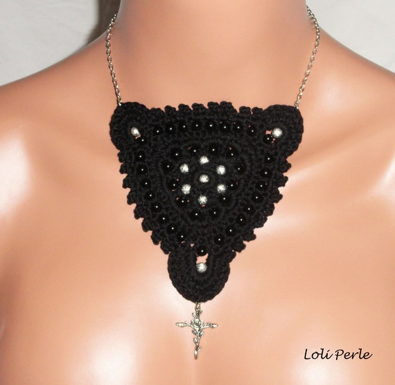 Black crocheted necklace with embroidered beads and cross