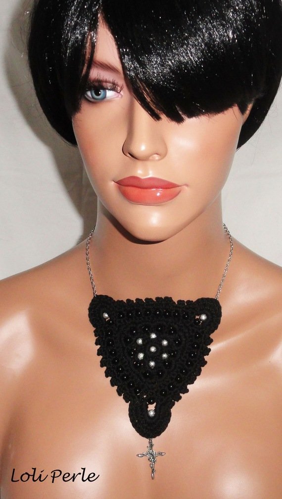 Black crocheted necklace with embroidered beads and cross