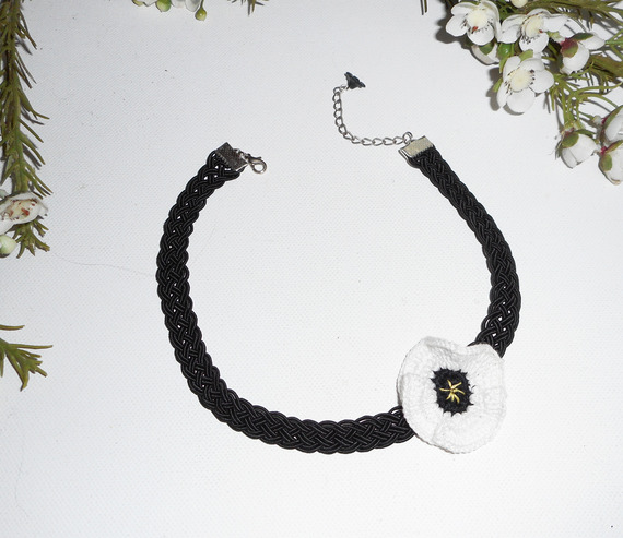 White poppy choker necklace on black braided cord