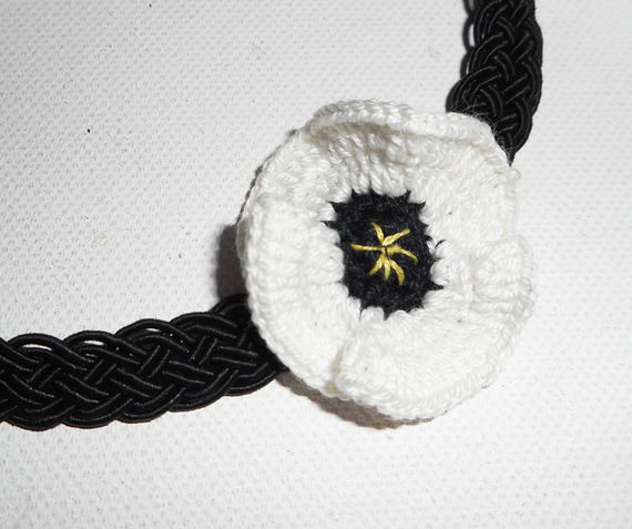 White poppy choker necklace on black braided cord