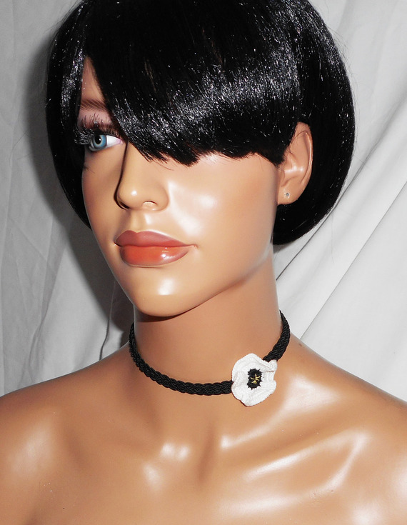 White poppy choker necklace on black braided cord