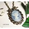 Blue cameo pendant with birds in bronze metal on chain