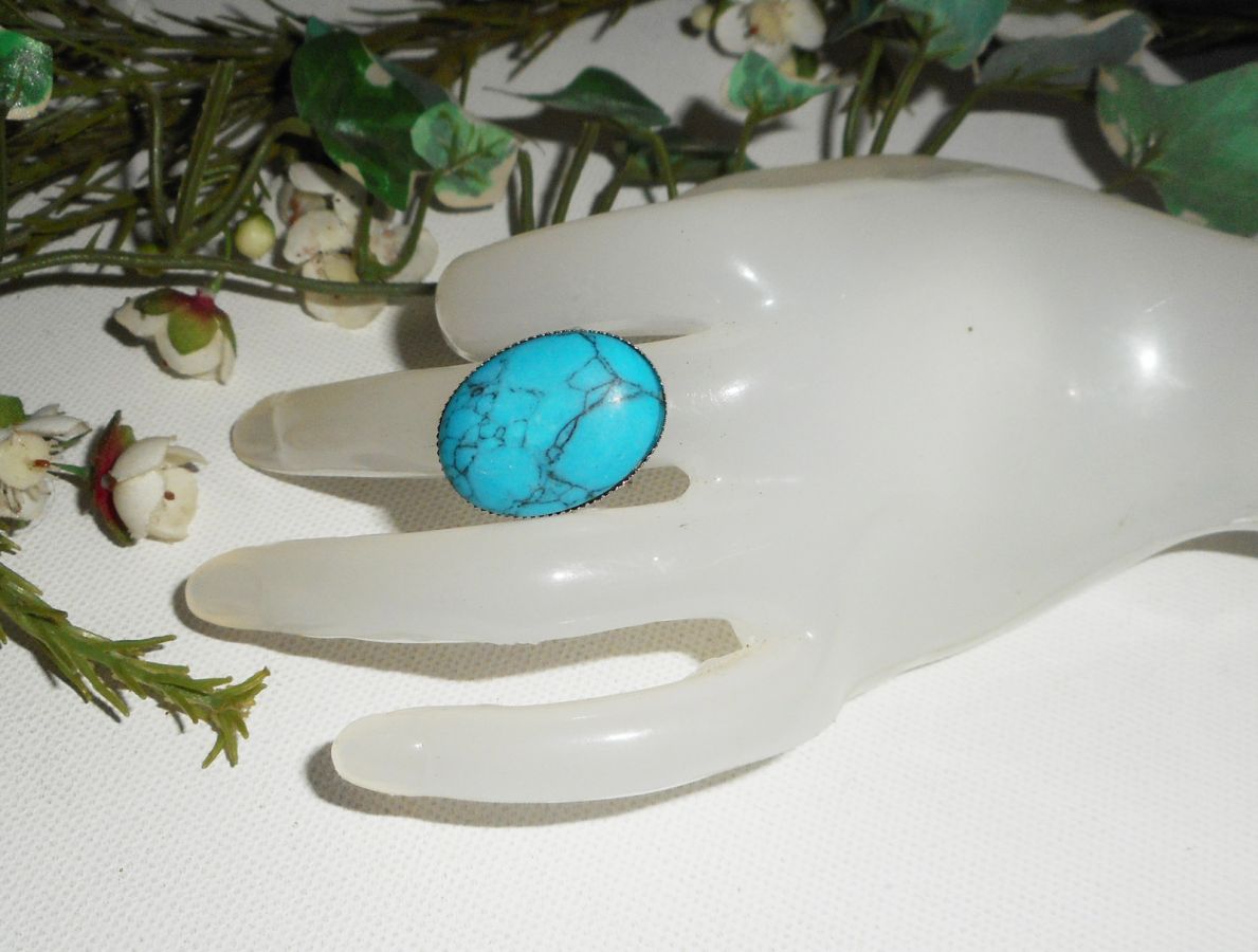 Cabochon ring with oval turquenite stone