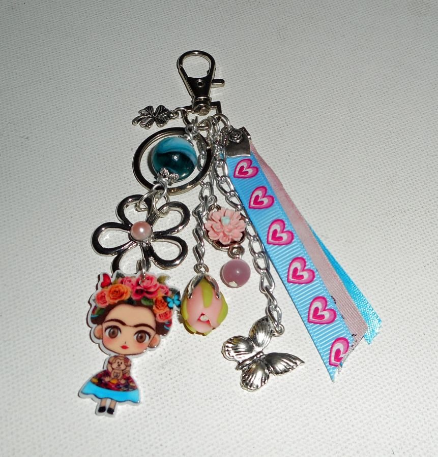 Frida pink and blue bag/keychain jewelry with flowers and ribbons