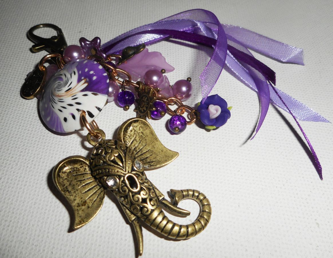 Elephant bag/keychain jewelry with clay beads, glass and purple ribbons