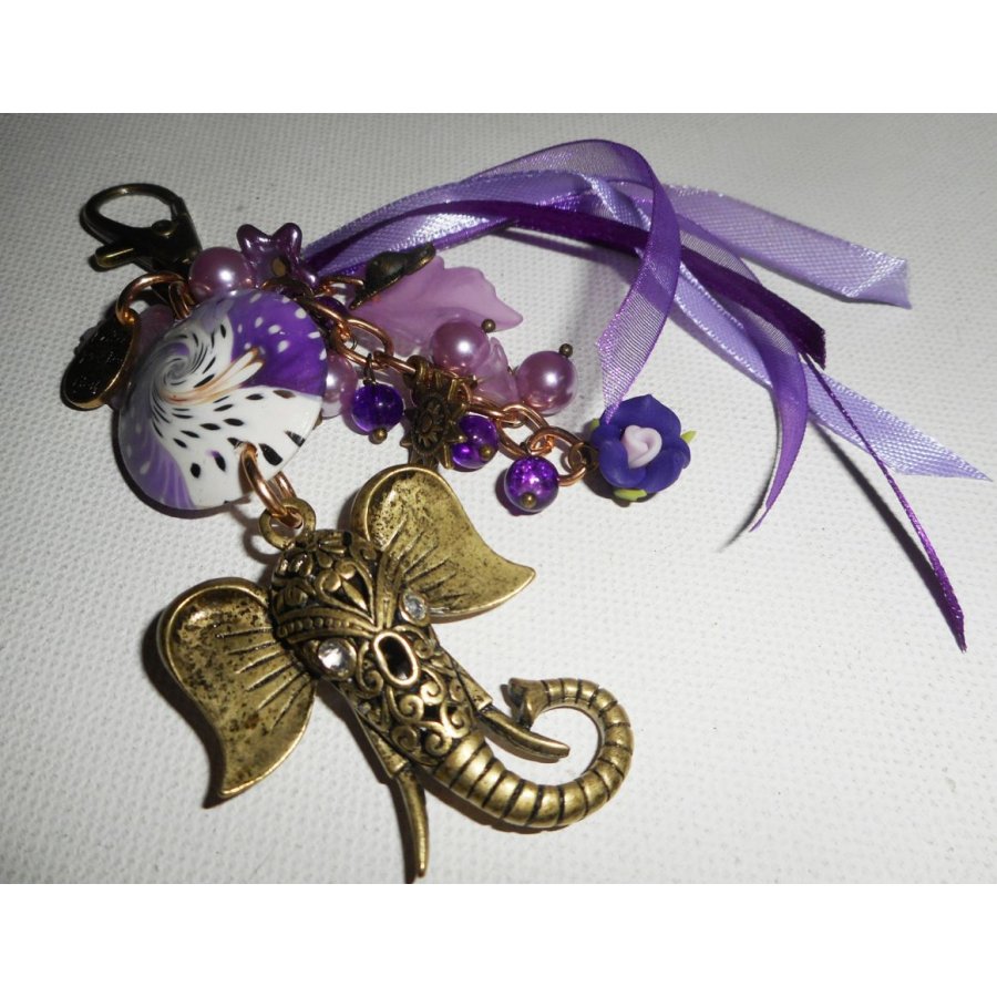 Elephant bag/keychain jewelry with clay beads, glass and purple ribbons