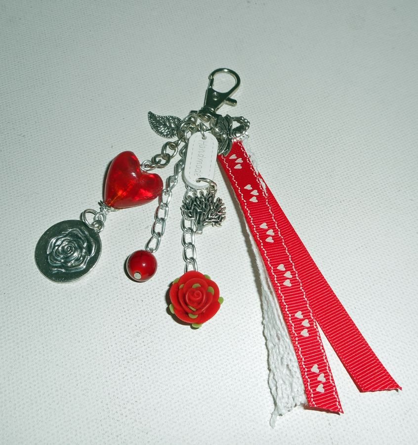 Red glass heart bag/key ring with lace and ribbons