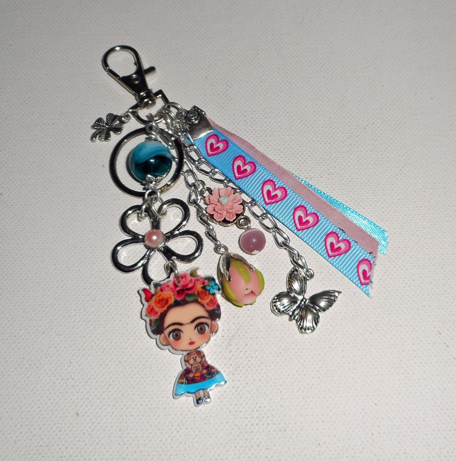 Frida pink and blue bag/keychain jewelry with flowers and ribbons