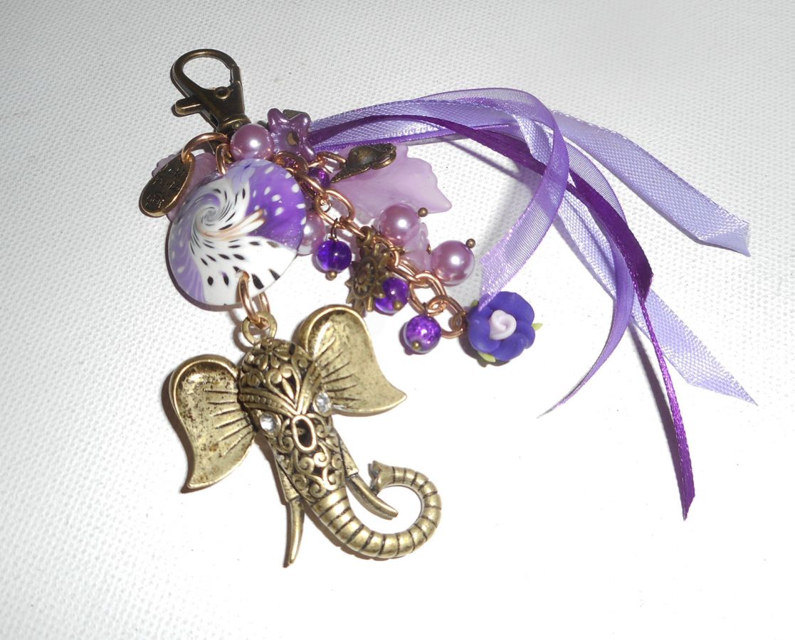 Elephant bag/keychain jewelry with clay beads, glass and purple ribbons