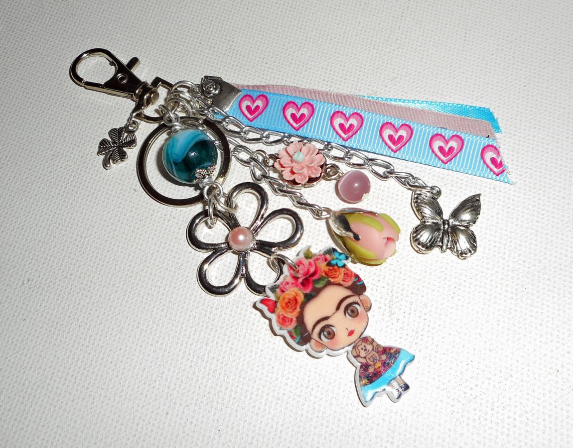 Frida pink and blue bag/keychain jewelry with flowers and ribbons