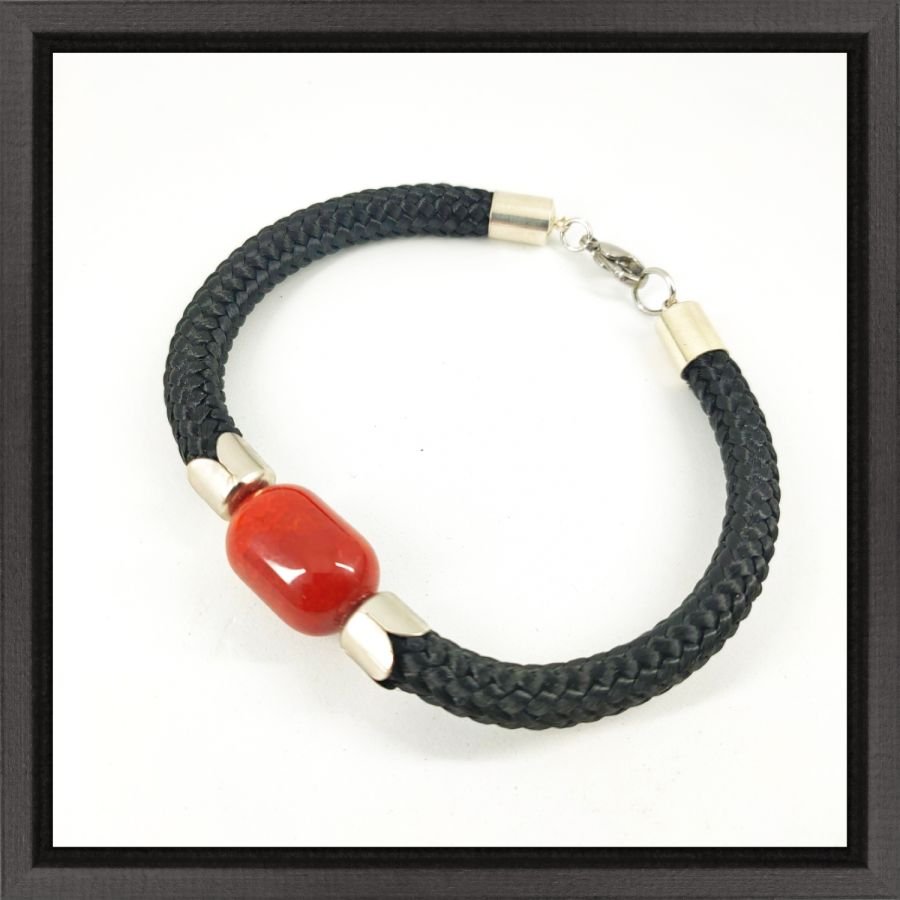 Woven rope bracelet with barrel carnelian stone