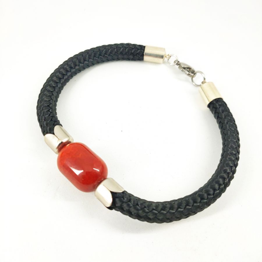 Woven rope bracelet with barrel carnelian stone