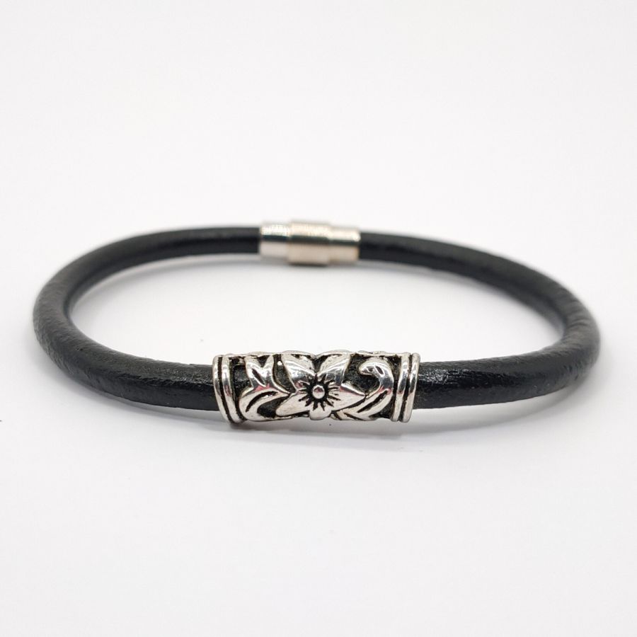 Floral bracelet on black leather cord