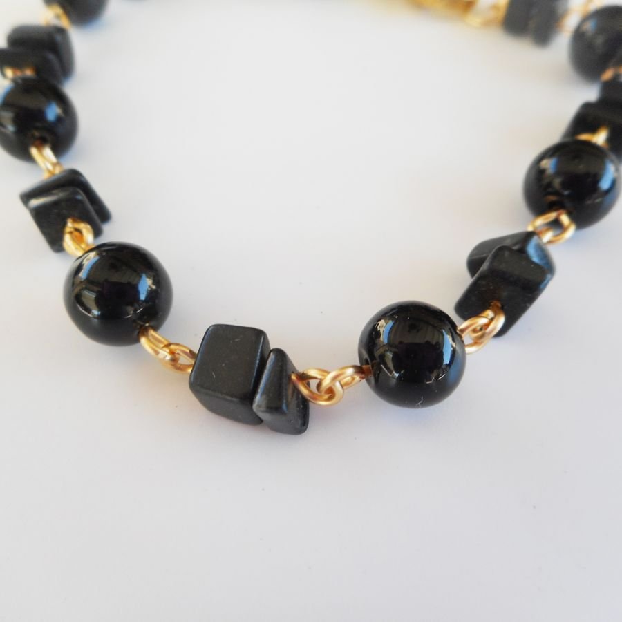 Onyx stones and gold-plated steel bracelet