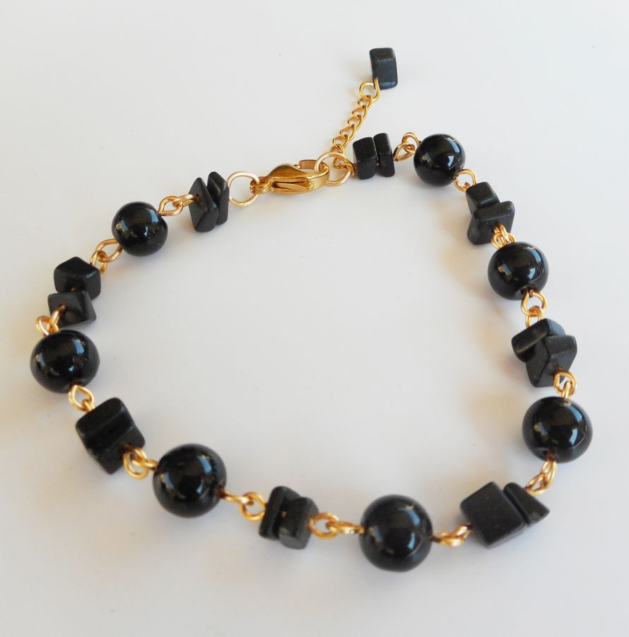 Onyx stones and gold-plated steel bracelet