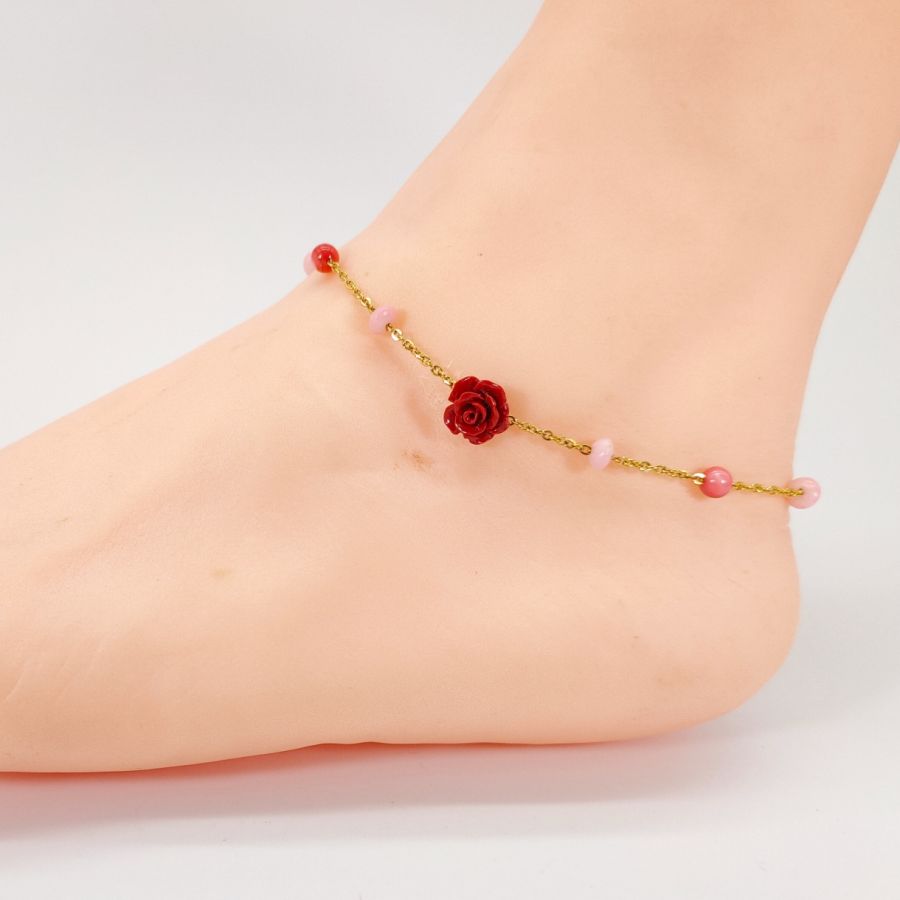 Coral anklet with red rose on gold steel chain