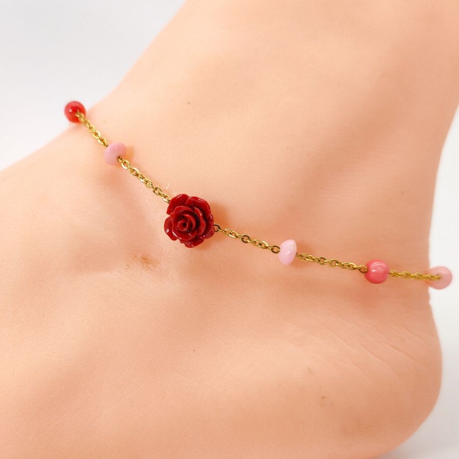 Coral anklet with red rose on gold steel chain