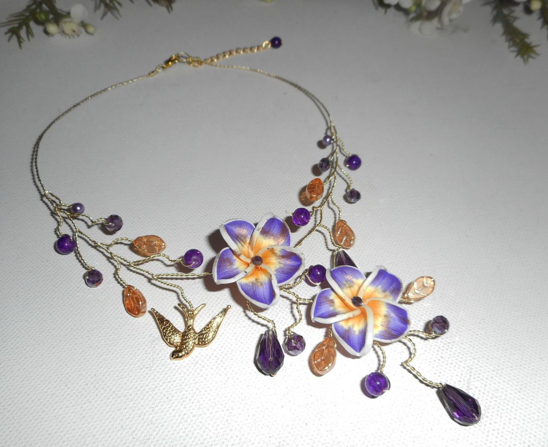 Airy necklace with hibiscus flowers and purple crystal beads