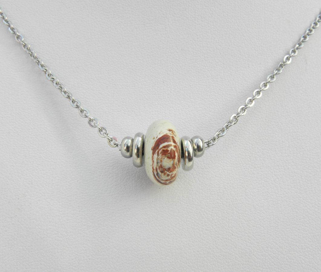 Solitaire necklace with beige round jasper stone and stainless steel beads