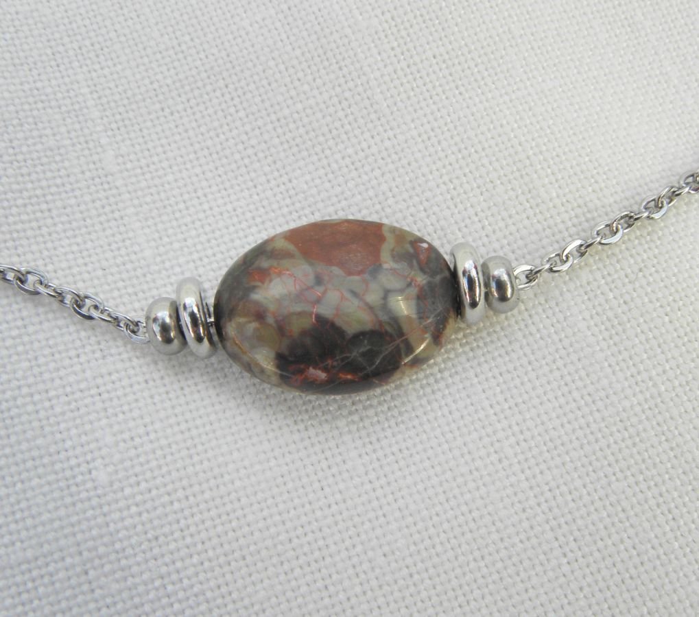 Solitaire necklace with oval jasper stone and stainless steel beads