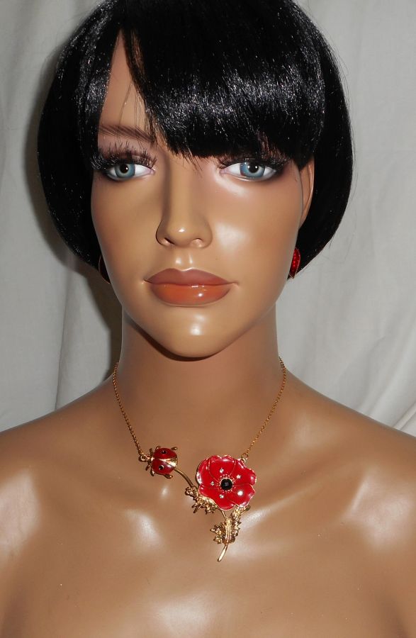 Poppy and ladybug necklace set in red enamel on gold steel chain