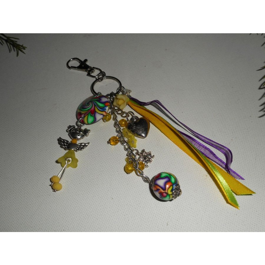 Keychain/Bag jewelry yellow doll with beads and multicolored ribbons