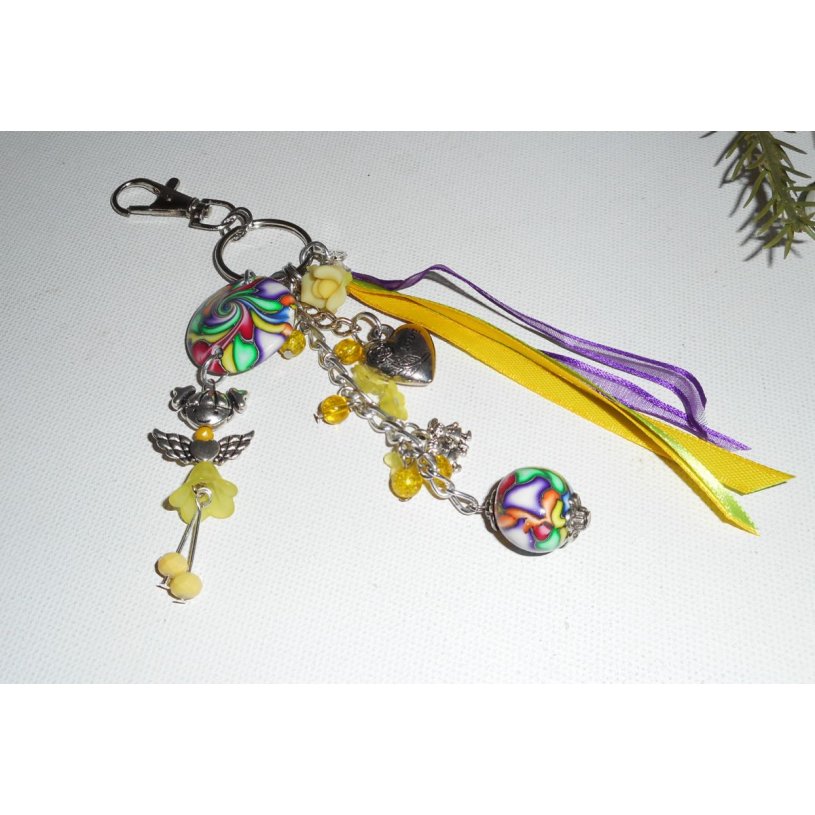 Keychain/Bag jewelry yellow doll with beads and multicolored ribbons