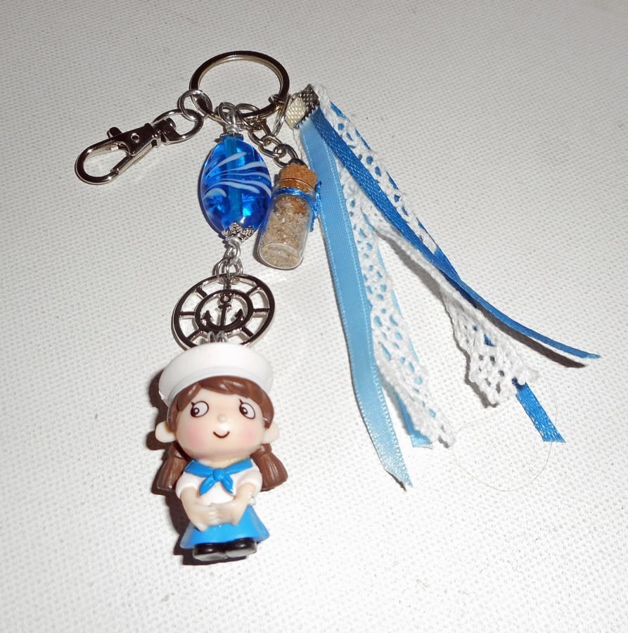 Keychain/Bag jewel with blue glass bead and small sailor with ribbons 